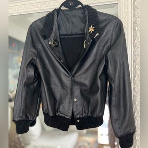 Leather bomber jacket with pins